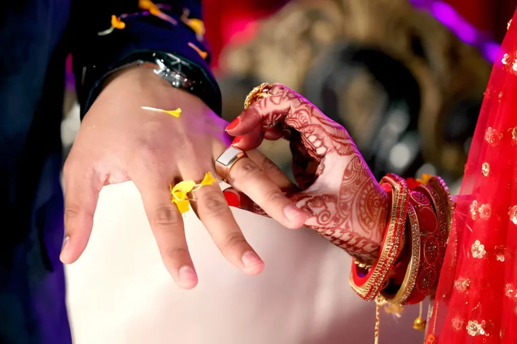 Indian Bride putting ring on indian Groom in engagment ceremony | Hindu marriages