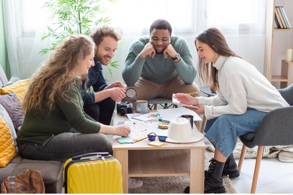 full shot people planning trip together 1