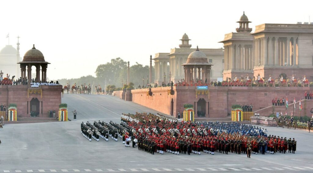 A grand view of the Beating Retreat ceremony at Vijay Chowk in New Delhi, showcasing uniformed bands, military precision, and architectural splendor.